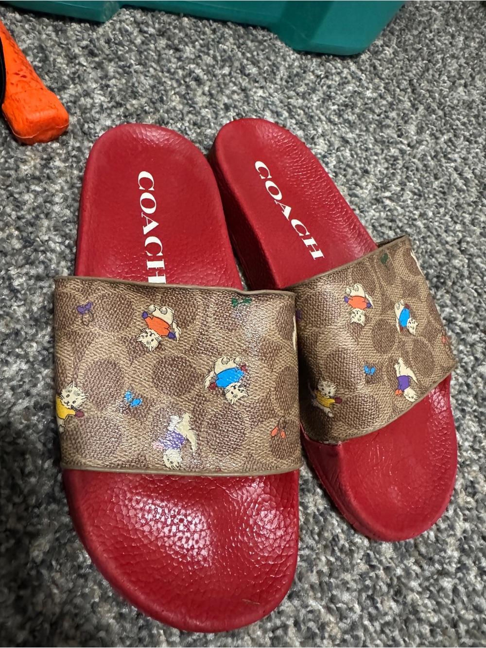 Coach Red Slide Sandals with Brown Signature Strap and Character Print